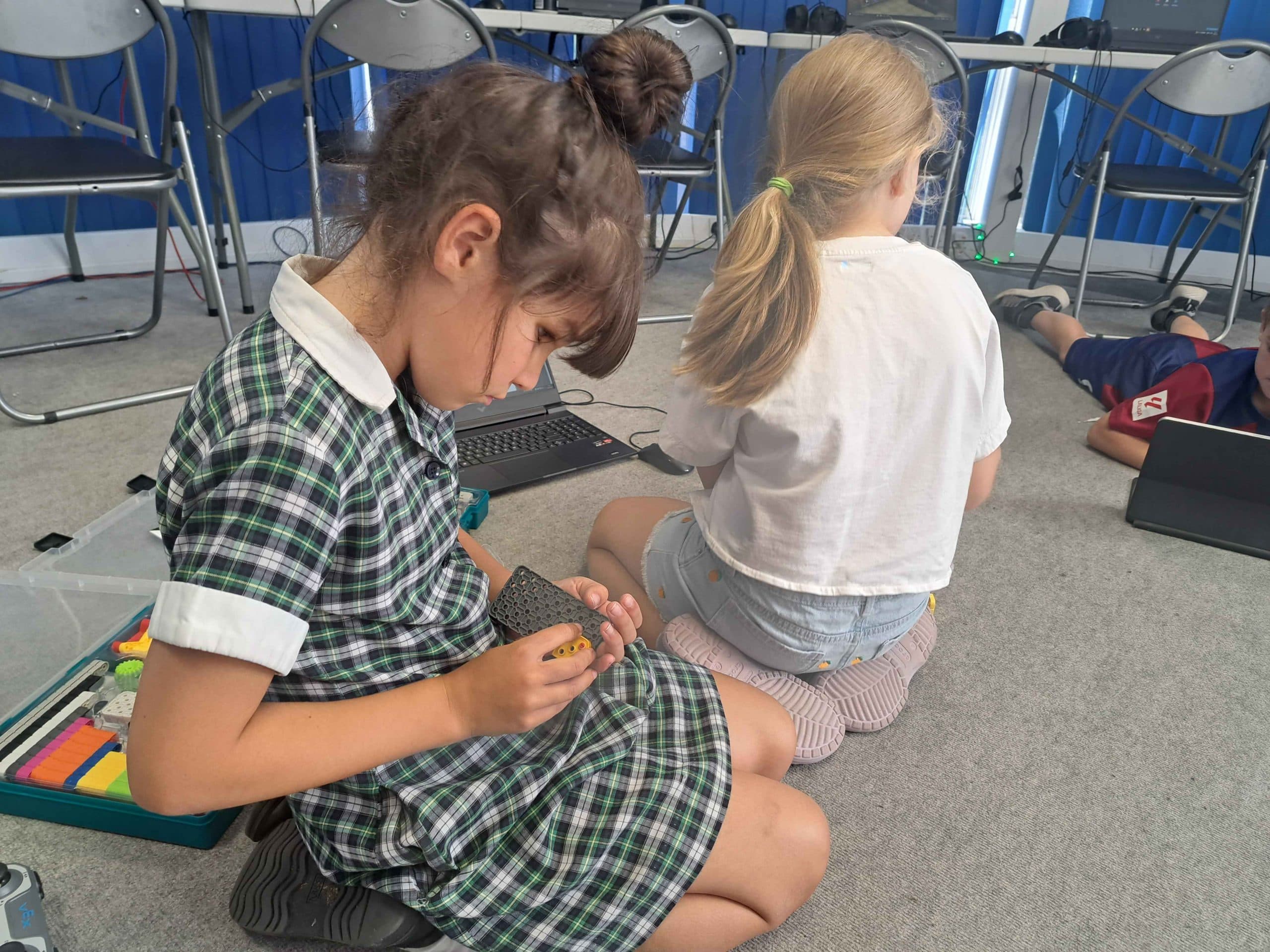 Kids enjoying a coding session at a Player Ready venue