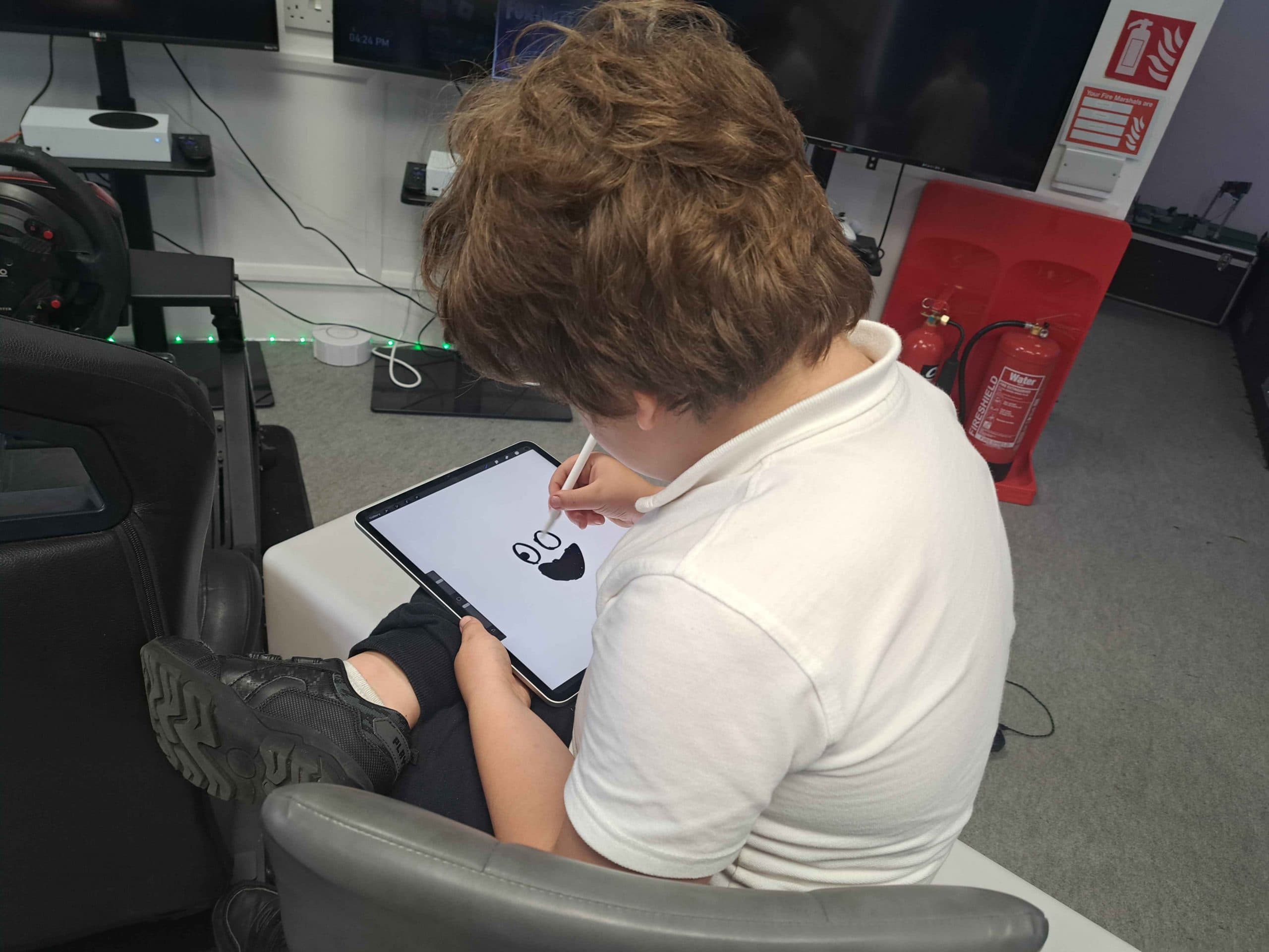 Young coders collaborating on a Minecraft project at Player Ready